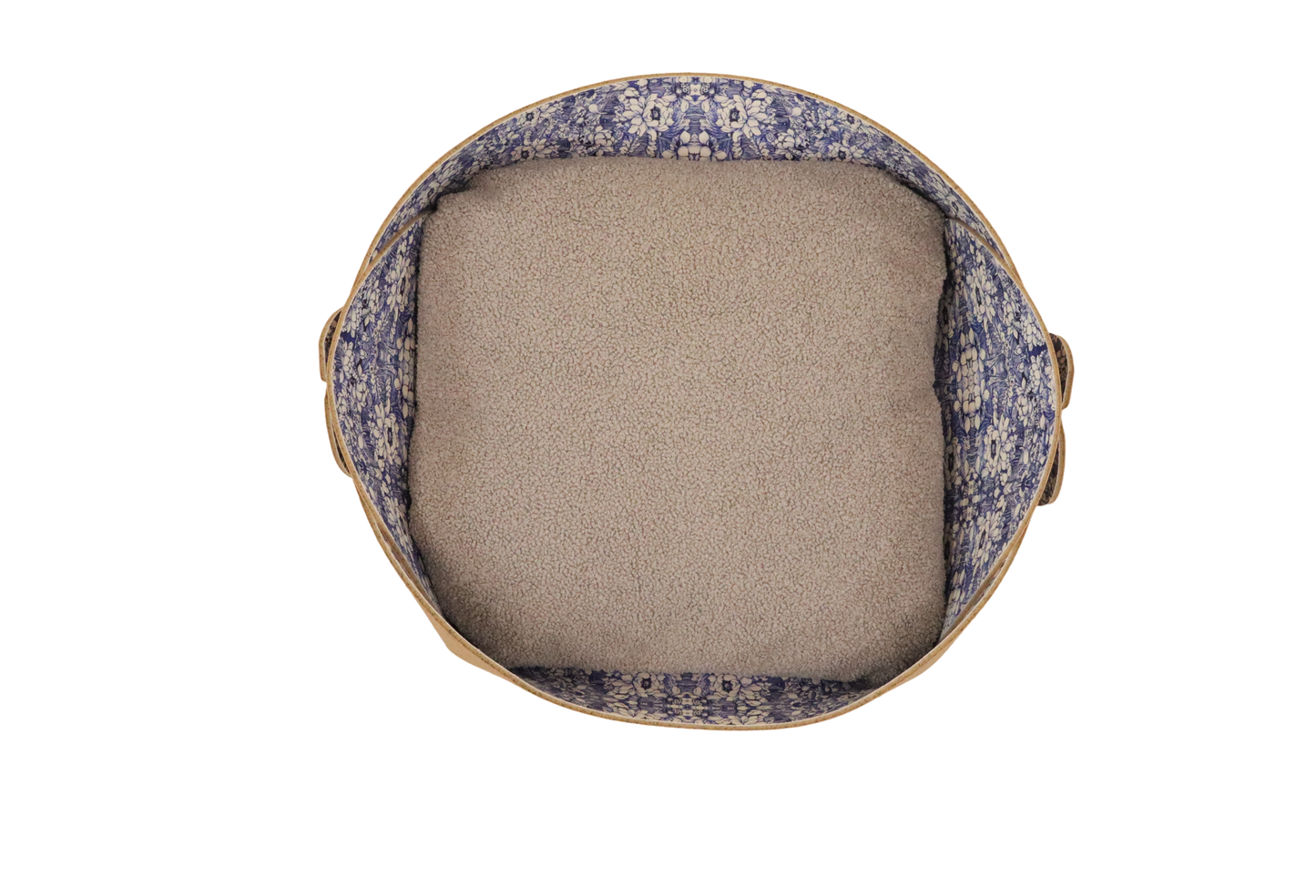 Round cushion with floral-patterned outer cover and beige inner filling on a white background
