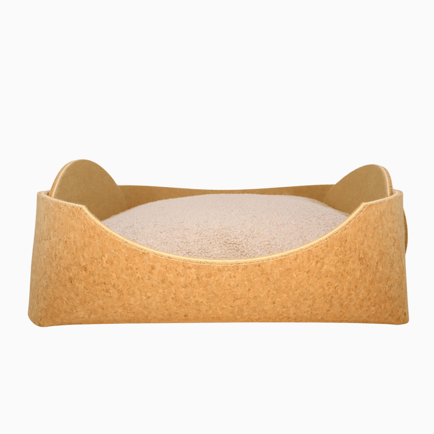 Cozy pet bed made of cork with raised sides and a soft beige cushion inside, designed for dogs and cats to sleep comfortably