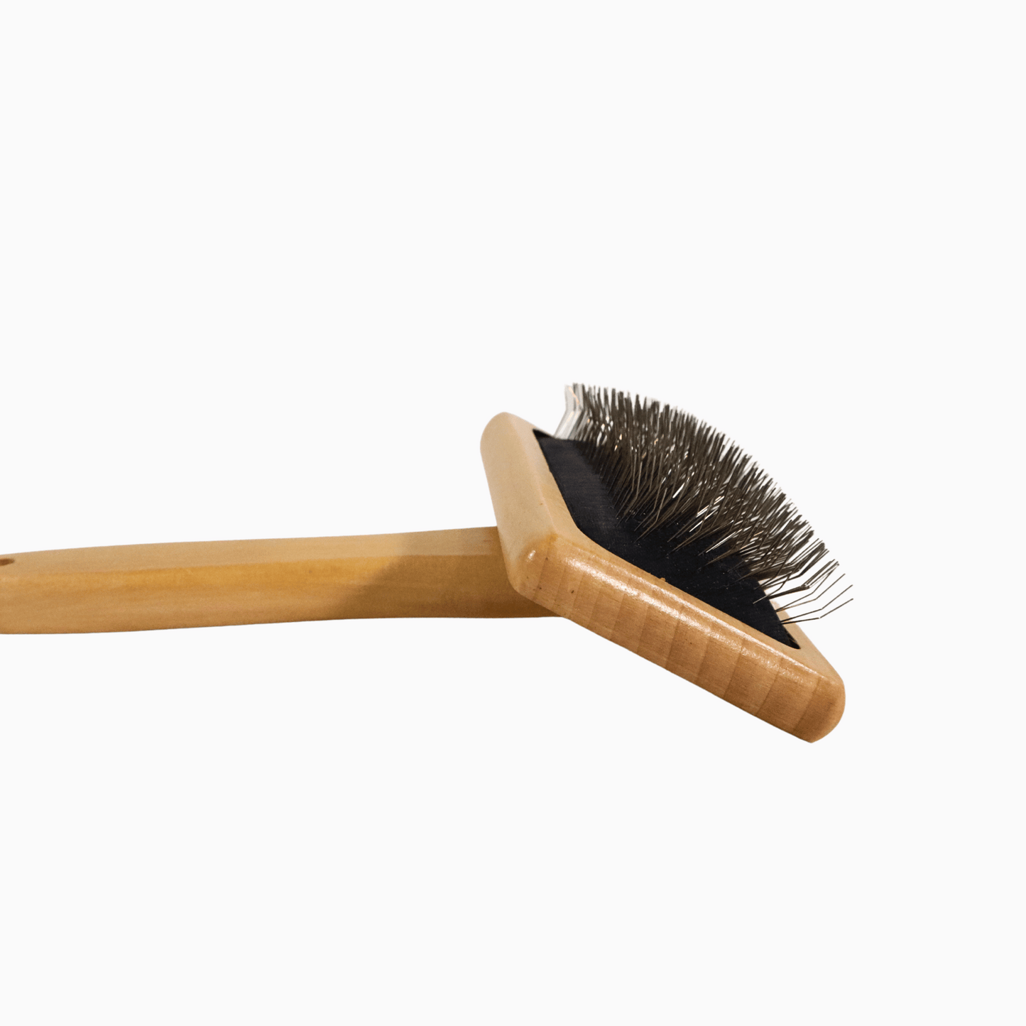 Wooden brush with a rectangular head and a customizable name on cylindrical handle, perfect for dog lovers