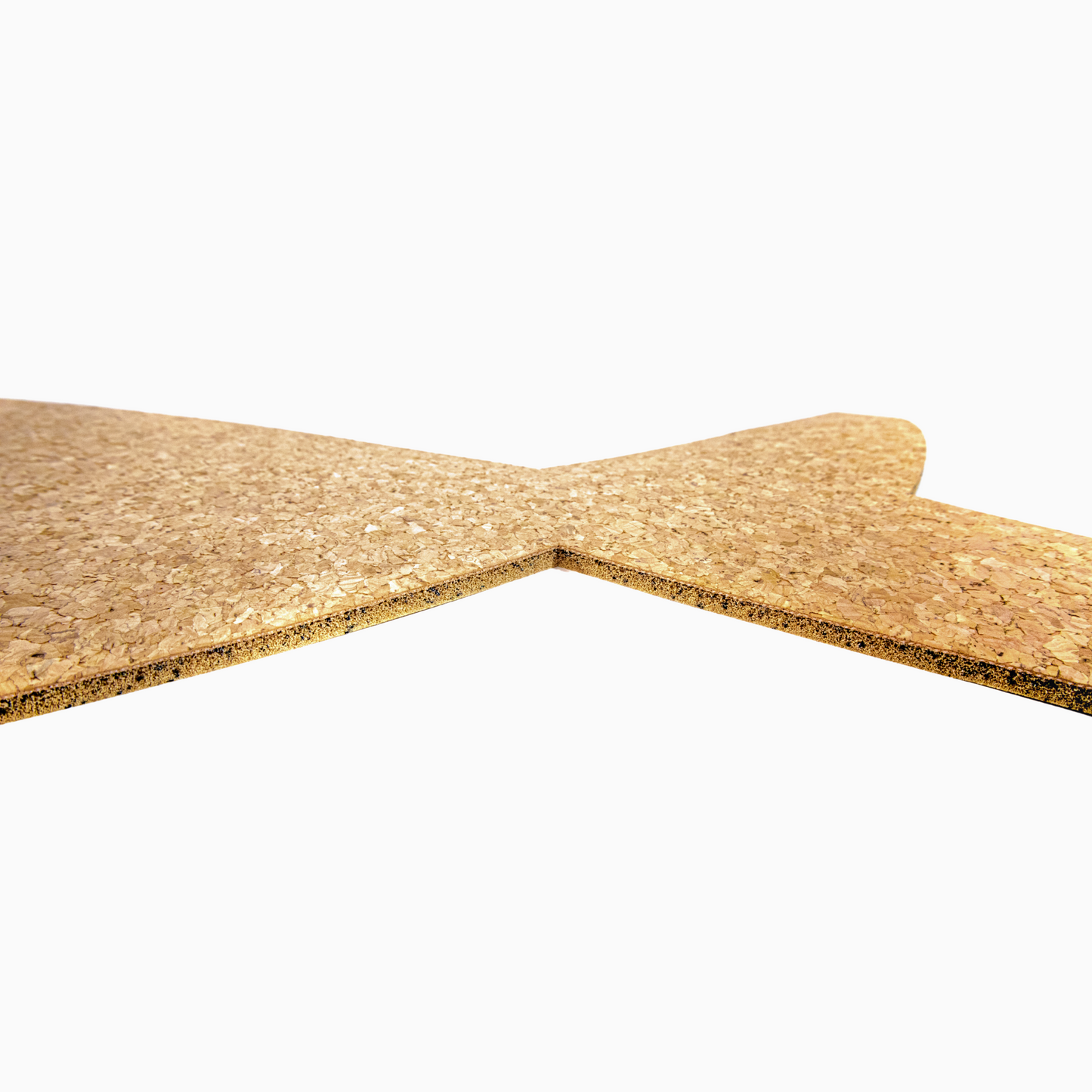 Close-up of a bone cork mat on a white background