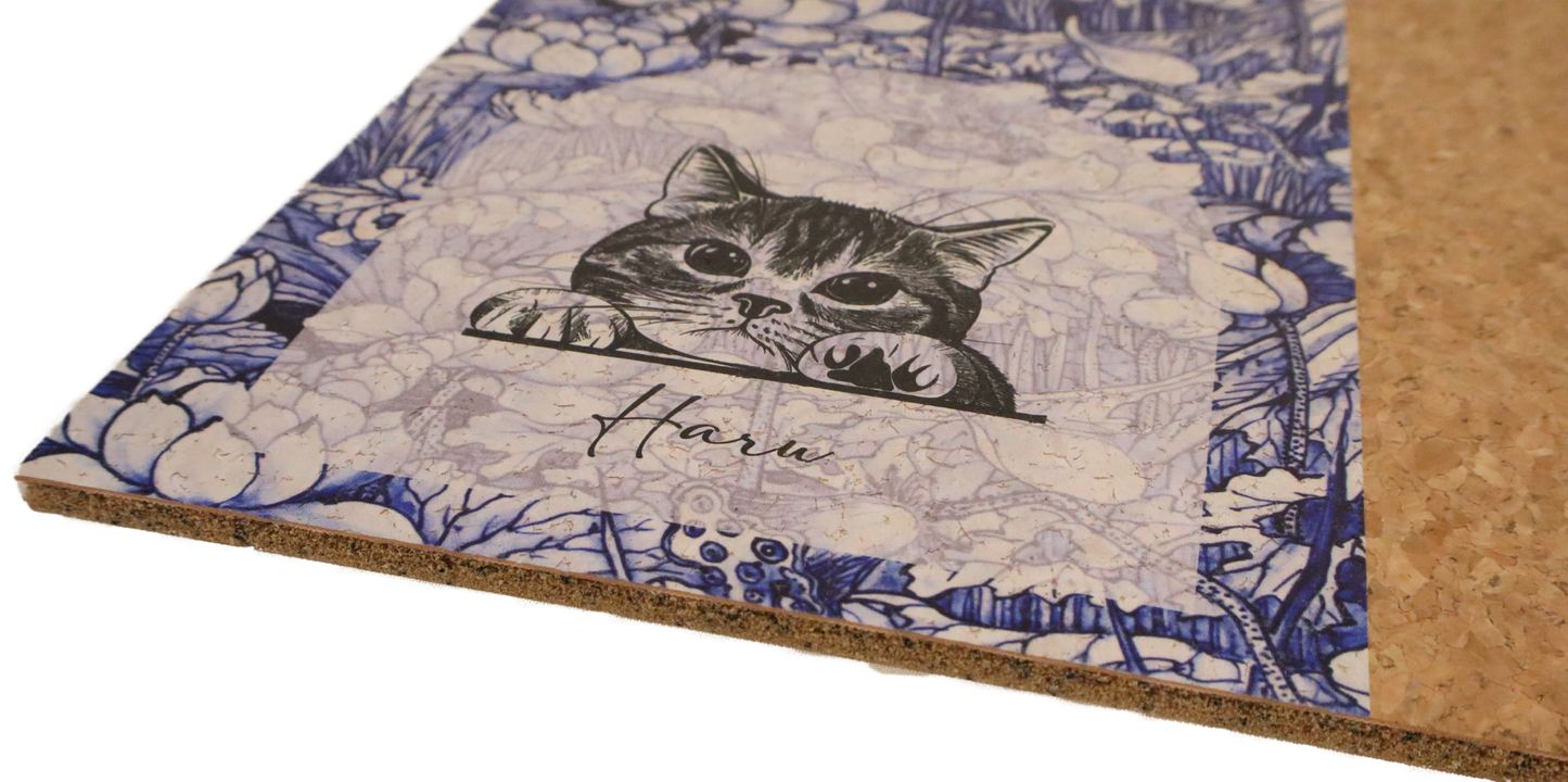 Cardboard product with a cat illustration and floral design on a white background
