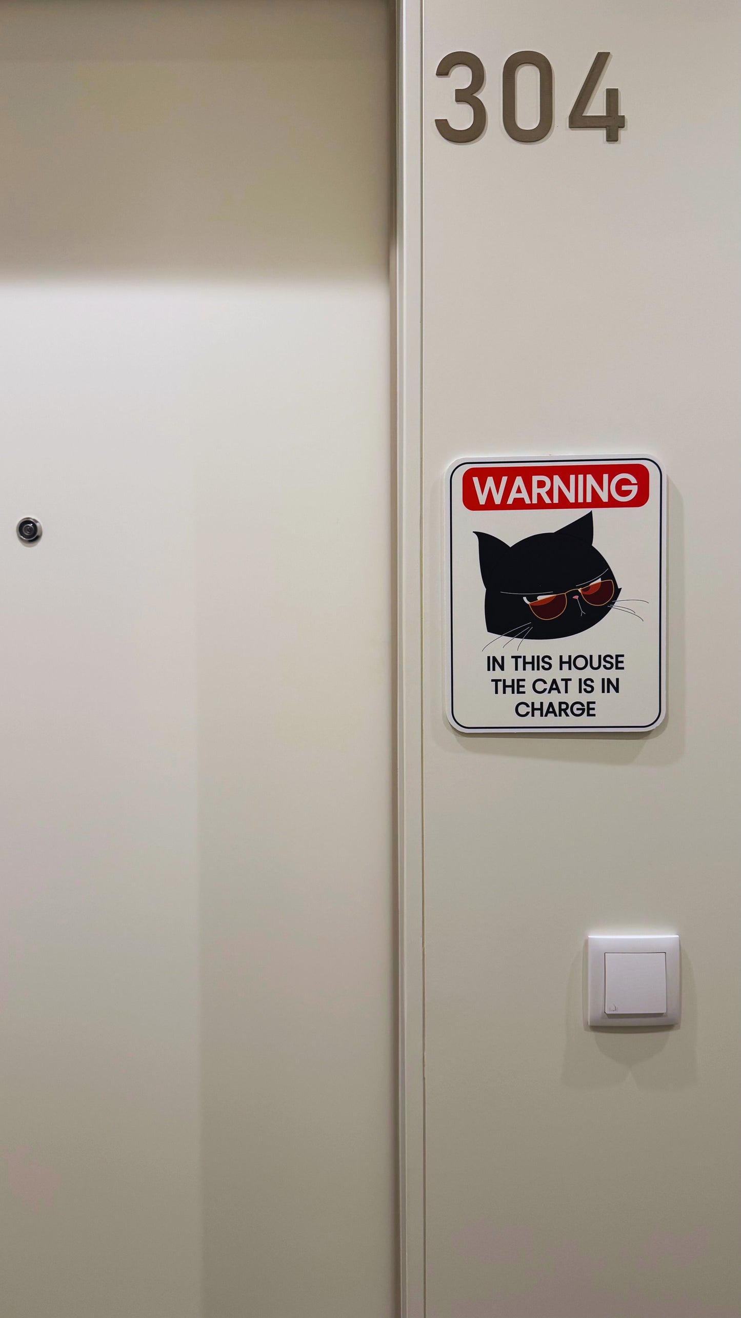 Cat Is In Charge Sign