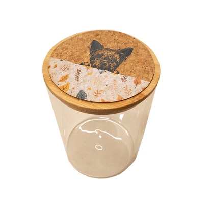 Glass jar with a cork lid featuring a dog illustration on a white background