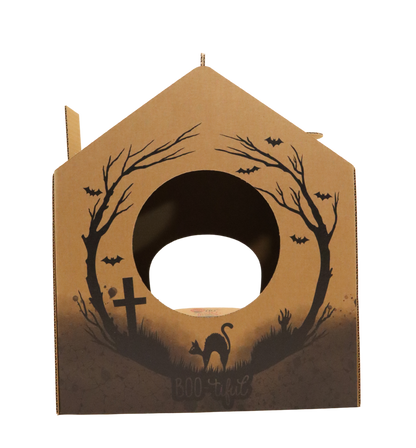 Halloween-themed cardboard cutout with tree, bats, and cat design on a white background