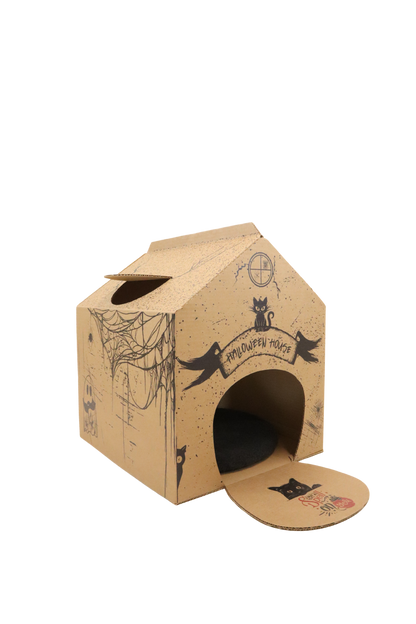 Cardboard cat house with spider web and cat illustrations on a white background