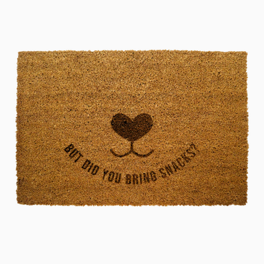 Doormat with heart design and text 'But did you bring snacks?' on a white background, perfect for dog lovers