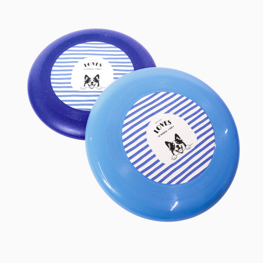 Two blue frisbees with a customizable dog illustration on a white background