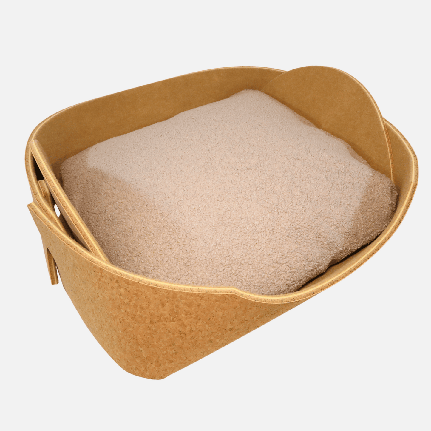 Cozy pet bed made of cork with raised sides and a soft beige cushion inside, designed for dogs and cats to sleep comfortably