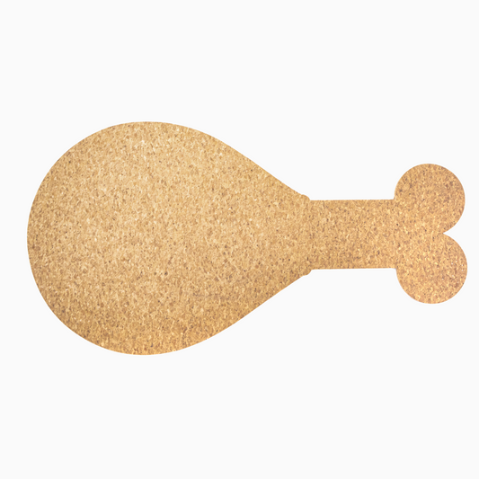 Cork mat shaped like a chicken drumstick on a white background