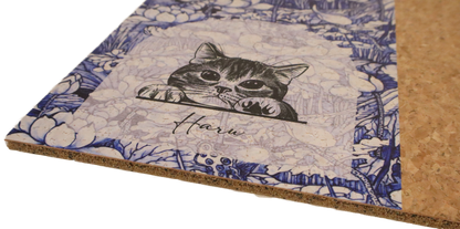 Cardboard product with a cat illustration and floral design on a white background
