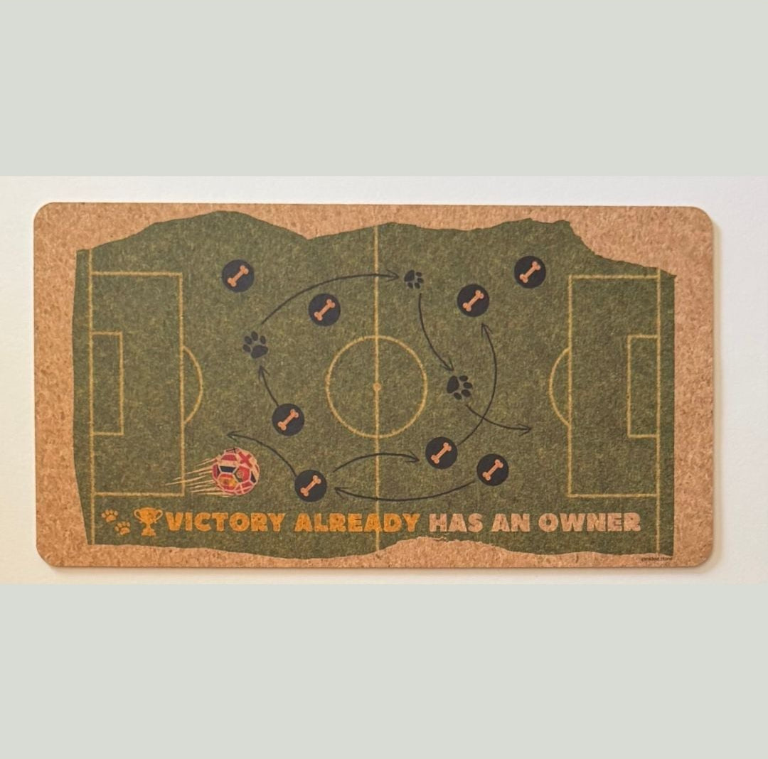 Decorative mat with soccer field design and text on a light gray background